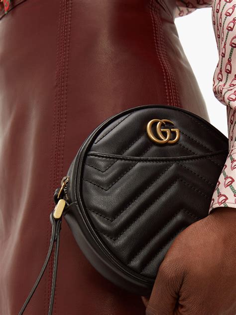 gucci marmont wrist pouch|Gucci Marmont quilted leather handbag.